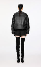 Damen Avantgarde Boxy Daunenjacke mit Leder Optik