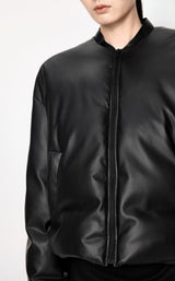 Damen Avantgarde Boxy Daunenjacke mit Leder Optik